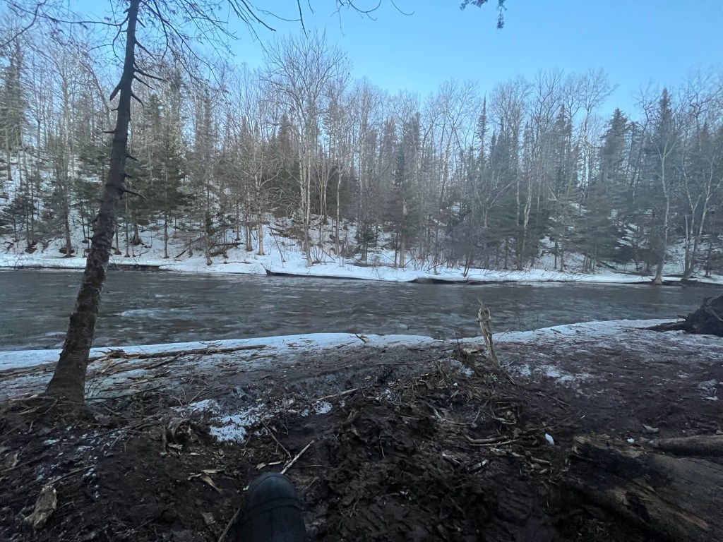 UWS Student Relaxes on the Brule River The Promethean